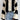 Striped knit sweater featuring chunky knit texture and bell sleeves, styled with jeans and highlighting a fashionable look.