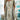 Striped tunic dress in gray, featuring a casual knee-length design with a neutral summer fashion style, displayed on a hanger.