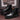 Stylish durable men's black leather work boots with non-slip soles and ankle support, size 45.