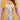 Plus size yellow tunic top with scoop neck, floral print, and pleated details.