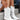 Stylish white women's perforated western ankle cowboy boots featuring a comfortable fit.
