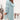 Stylish women's light blue oversized winter coat featuring a chic design with a prominent collar, long sleeves, and a loose fit that falls around the waist and thighs.
