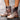 Tan leather boots with a contrast strap and rugged sole, shown in a khaki color, size 42.