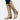 Taupe suede knee-high boots with a Western-inspired design, featuring a studded heel and a side zipper.