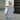 Teal long sleeve knit cardigan worn by a standing model, showcasing its stylish design perfect for fall fashion layering. The cardigan features a collar and covers the shoulders, waist, and knees.