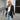 Teal long sleeve knit cardigan worn over a pair of jeans, showcasing a stylish fall fashion layering piece with emphasis on shoulder and waist fit.