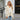 Teal long sleeve knit cardigan modeled by a woman with long hair, showcasing its collar, shoulder, sleeve, and waist design as a stylish fall fashion layering piece.