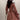 Elegant terracotta satin evening gown featuring puff sleeves, fitted waist, and a flowing skirt, designed as a stylish and sophisticated bridesmaid dress.