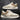 Men's white suede low-top lace-up sneakers in a beige colorway, size 43, featuring a sleek design with subtle grey and black accents.