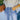 Trendy Women's High-Waisted Light Wash Button-Fly Skinny Jeans being worn, highlighting the high waist and button-fly design, with a light wash denim finish.