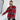 Trendy women's oversized plaid jacket in a chic tartan pattern, worn by a woman standing confidently with sunglasses, showcasing the shoulder and sleeve details for a stylish autumn streetwear look.