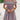 Woman wearing a green and white tribal print V-neck A-line midi dress with short sleeves.