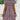 Woman wearing a Tribal Print V-Neck A-Line Midi Dress with boho chic style, featuring a white and azure pattern, shown from shoulder to leg.