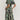 Tropical Leaf V-Neck Mini Dress with short sleeves, featuring a vibrant bohemian pattern, displayed on a mannequin highlighting its day dress style and summer resort wear appeal.