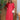 Turquoise linen summer dress with asymmetrical hem and long sleeves, displayed on a mannequin standing outdoors.