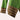 Asymmetrical ruffled sweater in a two-tone green and brown design, featuring long sleeves and a toggle closure, crafted from a woolen, woven fabric.