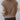 A two-tone chunky knit bomber jacket designed for women, featuring a grey and contrasting color scheme, with a textured outerwear style perfect for winter fashion. The jacket has a prominent shoulder design, a comfortable neckline, long sleeves, and a waist-length fit, modeled in a standing pose showcasing the garment's structure and trendy appeal.