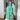 Vibrant green wide-leg jumpsuit for women, featuring a casual summer design with a sleeveless cut, relaxed fit, and elegant wide legs.