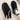 Warm sheepskin suede slippers with non-slip sole on a person's foot.