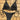 Handmade white crochet bikini with adjustable triangle top and tie-side bottoms displayed on a wooden surface.