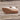 White floral wedge sandals with beaded strap and cutout design, featuring a brown wooden wedge heel and beige leather detailing.