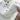 Men's white breathable cotton short sleeve polo shirt with a classic collar, ideal for summer wear.