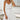 White sleeveless backless A-line mini summer dress for women, showcasing details like the shoulder, waist, and leg.