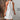 White sleeveless eyelet halter dress designed for casual and beachwear occasions, featuring knee-length style.