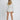 Women's beige belted blazer featuring a tailored fit, highlighting the waist with structured shoulders and long sleeves.