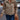 Women's beige corduroy jacket featuring a button-up front and adjustable waist, displayed on a mannequin, showcasing its fashionable design and textured textile.