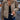 Women's beige corduroy jacket with button-up front, adjustable waist, long sleeves, and a classic collar, shown as an outerwear fashion piece.
