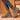 Women's beige high-top sock sneakers worn with grey jeans, showcasing lightweight ergonomic design for comfort.