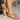 Women's black wedge sandals with elegant floral embroidery, showcasing a comfortable design.