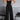 Women's black sleeveless wide-leg spandex jumpsuit, featuring a fitted waist, round neckline, and stylish urban summer design.