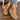 Women's black zipper ankle boots with a stylish design, shown paired with denim jeans, highlighting their casual and fashionable appeal.