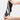 Women's cozy fleece-lined slippers with anti-skid soles placed on a soft surface.