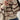 Women's cream and burgundy striped sweater featuring puff sleeves, showcased on a model with focus on the neckline, sleeves, and waist area. The model's pose highlights the sweater's design and fit.