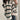 Women's cream and burgundy striped puff sleeve sweater, featuring a comfortable knit design perfect for autumn, showcased on a model.