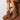 Brown women's embroidered leather cowboy boots displayed on a model, showcasing chic western style with intricate stitching and design details.
