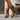 Women's embroidered leather cowboy boots with chic western style detailing, featuring intricate designs and a knee-high cut.