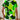 Women's short sleeve summer blouse with green leaf print, featuring a white background and a round neckline.