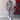 Women's grey loungewear set featuring a stylish and comfortable sweatshirt with long sleeves and matching pants. The set is displayed in a fashion-forward design, with a focus on casual elegance and comfort.