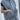 Women's grey sleeveless quilted puffer vest with a high collar, designed for lightweight winter layering.