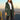 Women's grey waterproof hooded raincoat featuring a lightweight, urban style design with long sleeves, standing collar, and waist-length cut, ideal for fashion-forward outerwear.