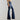 Women's high-waist dark wash flared stretch jeans.