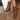 Brown women's lace-up leather ankle boots with a 7.5cm heel, showcasing a stylish and fashionable design. The boots are worn, highlighting the leg and foot, emphasizing their beauty and pattern details.