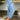 Women's light-wash high-waist ankle-length relaxed fit jeans, featuring denim fabric in a light blue color.