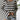 Women's lightweight black and white striped crewneck sweater displayed on a mannequin, showcasing its long sleeves and relaxed fit.
