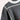Women's monochrome athletic set featuring a black and white sweatshirt and joggers, showcasing a sportswear design with a structured collar and sleeves.