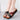 Women's multicolor wedge sandals with open toe design, showcasing comfort and fashion on a pair of legs.